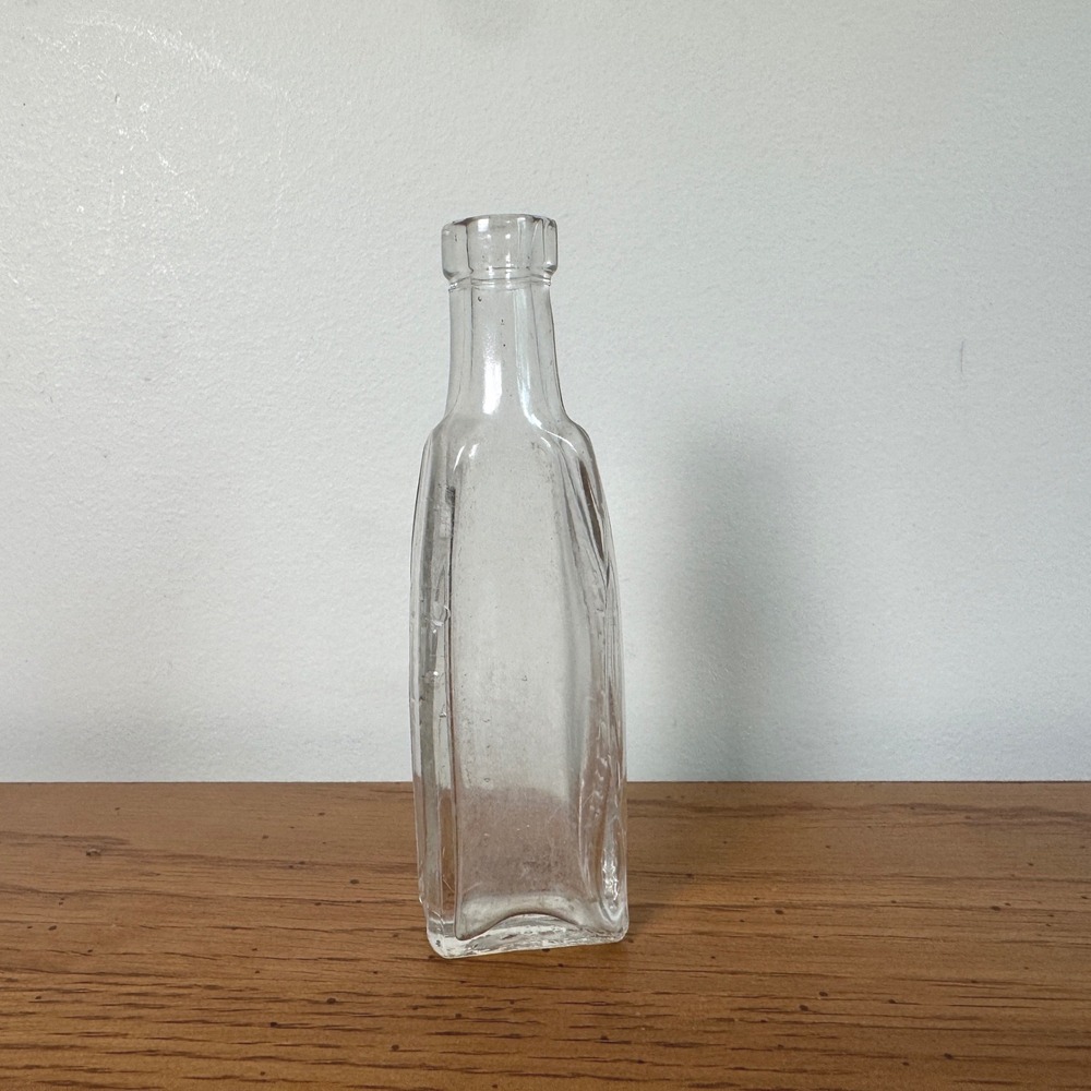 Antique Garrett & Co Inc Virginia Dare Clear Glass Bottle